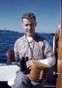 S0721 man with binoculers near ocean